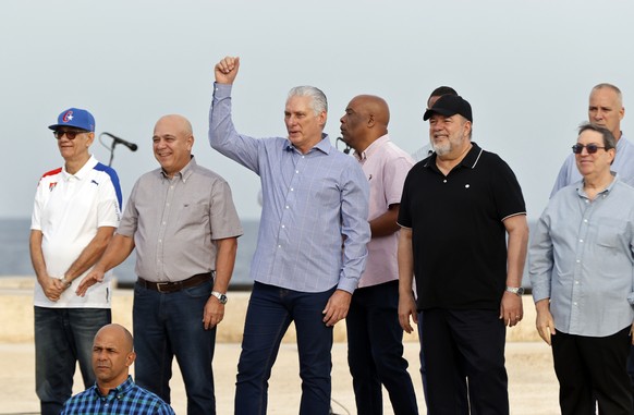 epa12866275 Cuban President Miguel Diaz-Canel (C) participates in an event ahead of the 'Youth Anti-Imperialist Parade on Wheels' in Havana, Cuba, 02 April 2026. The island continues to stru ...