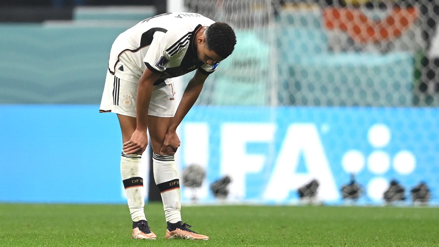 epa10342986 A dejected Jamal Musiala of Germany after the FIFA World Cup 2022 group E soccer match between Costa Rica and Germany at Al Bayt Stadium in Al Khor, Qatar, 01 December 2022. EPA/Georgi Lic ...