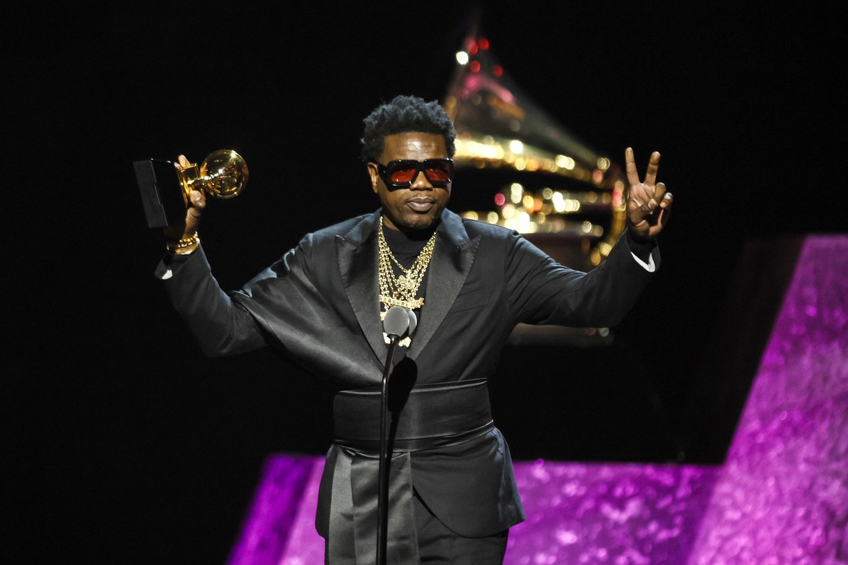 epa11128104 Theron Thomas accepts the "Songwriter Of The Year, Non Classical" award onstage during the Premiere Ceremony at the 66th annual Grammy Awards at Crypto.com Arena in Los Angeles,  ...