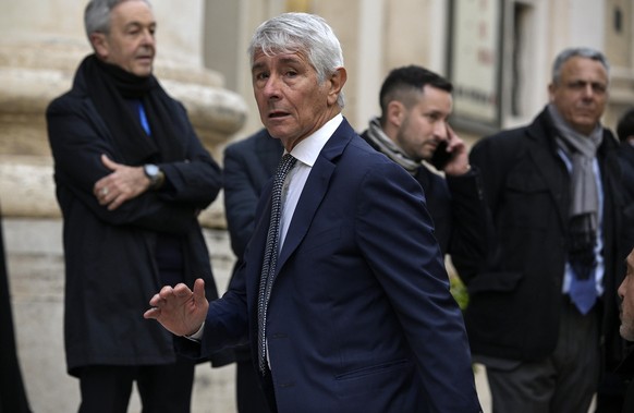 epa12639064 Italy's Minister of Sport and Youth Andrea Abodi attends a mass in memory of the victims of the Crans-Montana New-Year fire, at the Basilica of Saints Ambrose and Charles in Rome, Ita ...