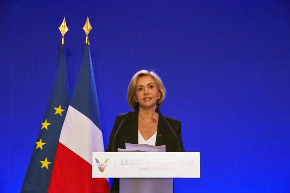 epa09883635 Presidential candidate of Les Republicains Valerie Pecresse delivers a speech after first initial results at her campaign headquaters at La Maison de la Chimie after the first round of the ...