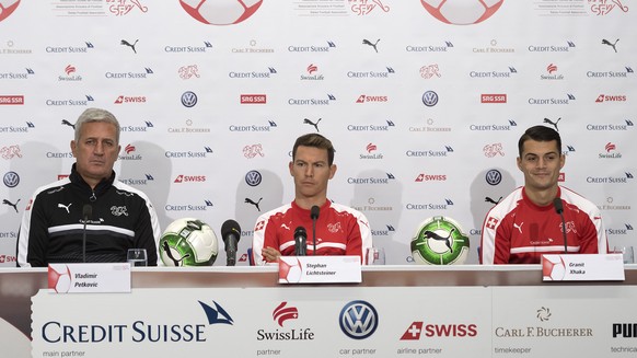 Switzerland&#039;s head coach Vladimir Petkovic, Stephan Lichtsteiner and Granit Xhaka, from left, attend a press conference of Switzerland&#039;s national soccer team, the day before the 2018 FIFA Wo ...