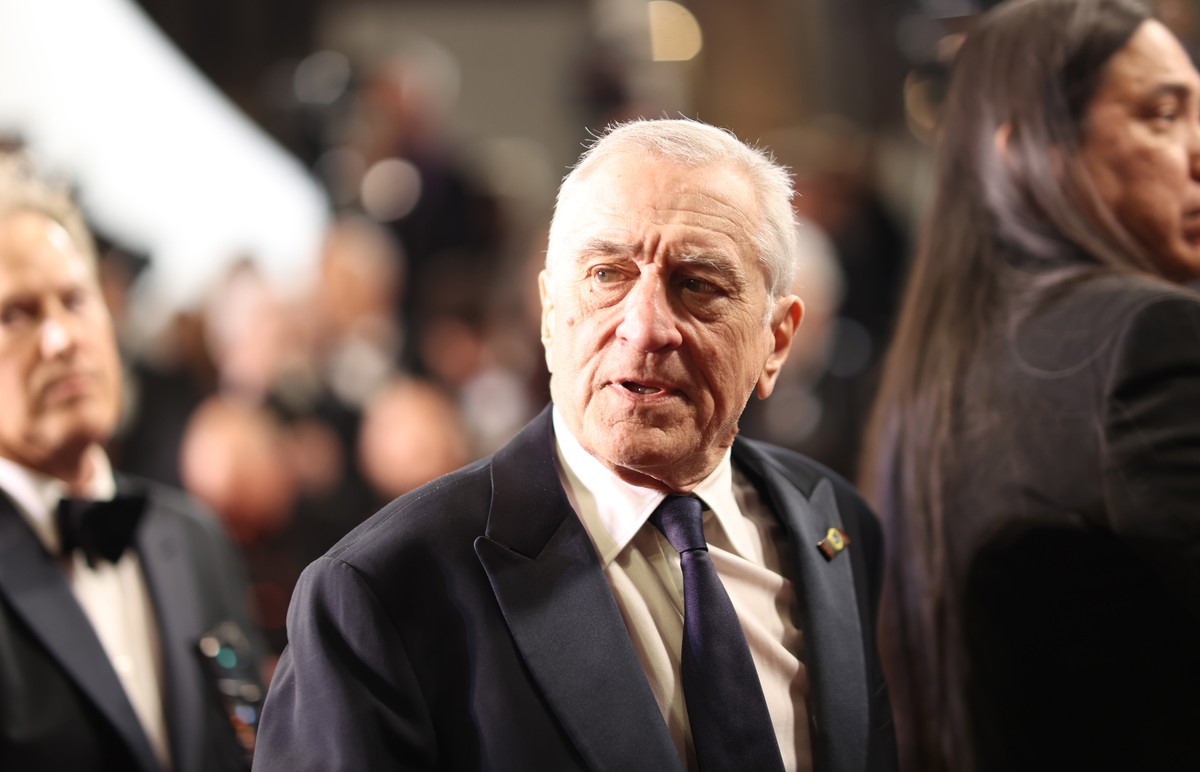 epa10642126 Robert De Niro (C) leaves the Festival Palace after the screening of 'Killers of the Flower Moon' during the 76th annual Cannes Film Festival, in Cannes, France, 20 May 2023. The ...