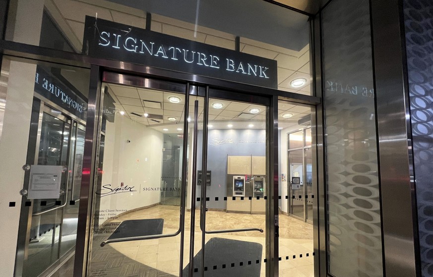 A branch of Signature Bank is photographed, late Sunday, March 12, 2023, in New York. Regulators announced that the New York-based bank had failed and was being seized. At more than $110 billion in as ...