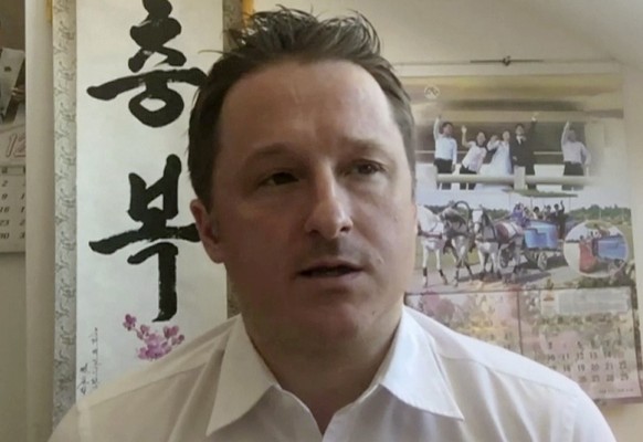 FILE - In this file image made from a March 2, 2017, video, Michael Spavor, director of Paektu Cultural Exchange, talks during a Skype interview in Yanji, China. The Canadian government says China wil ...