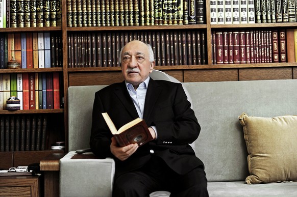 epa04139890 A handout picture made avaliable on 25 March 2014 provided by Zaman Turkish Daily newspaper shows Fethullah Gulen, an Islamic opinion leader and founder of the Gulen movement, poses during ...