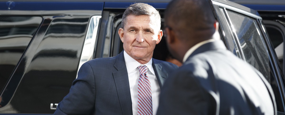 FILE - President Donald Trump's former National Security Advisor Michael Flynn arrives at federal court in Washington, Tuesday, Dec. 18, 2018. President Donald Trump has pardoned Michael Flynn, t ...