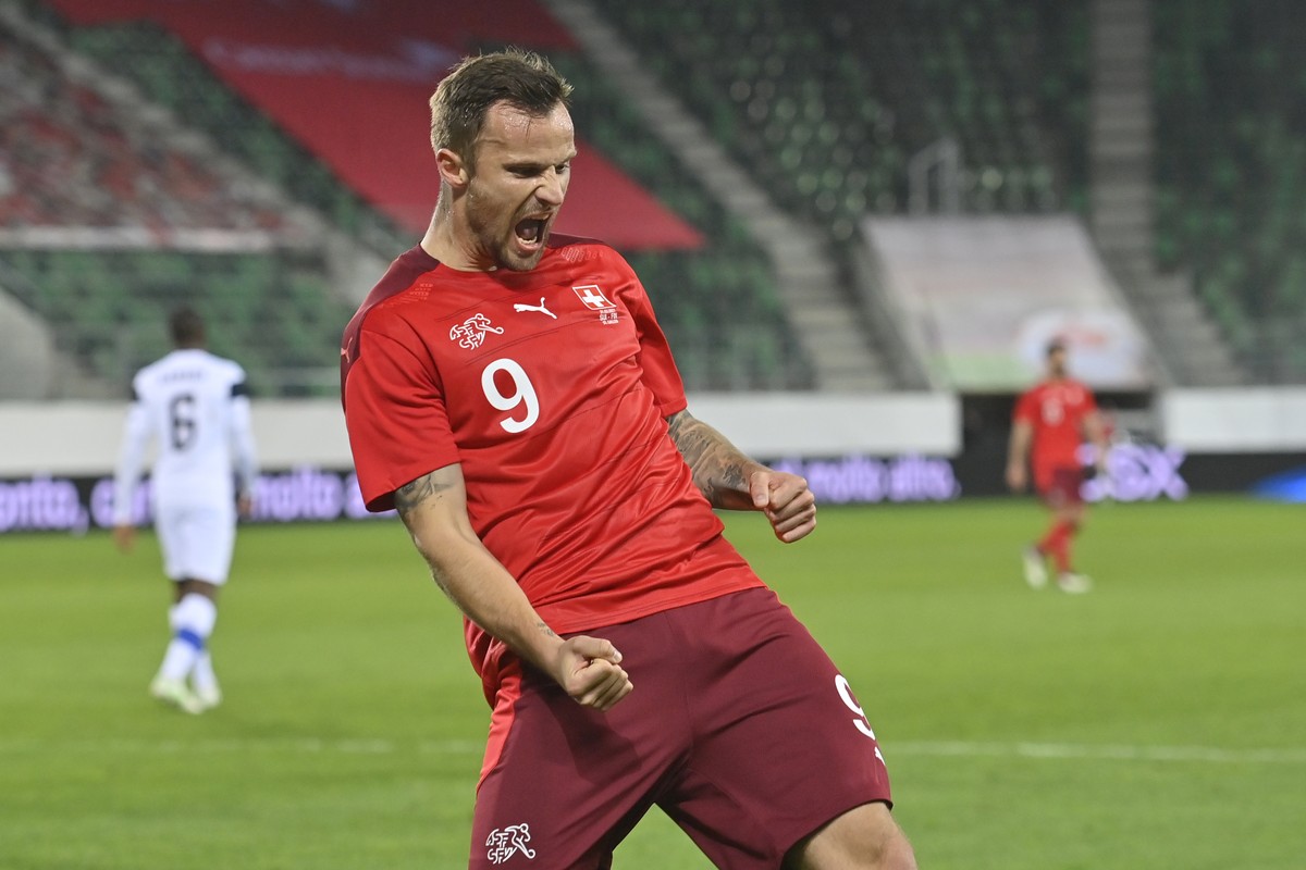 epa09109514 Switzerland's Haris Seferovic celebrates after scoring the 3-2 lead during the International Friendly soccer match between Switzerland and Finland in St. Gallen, Switzerland, 31 March ...