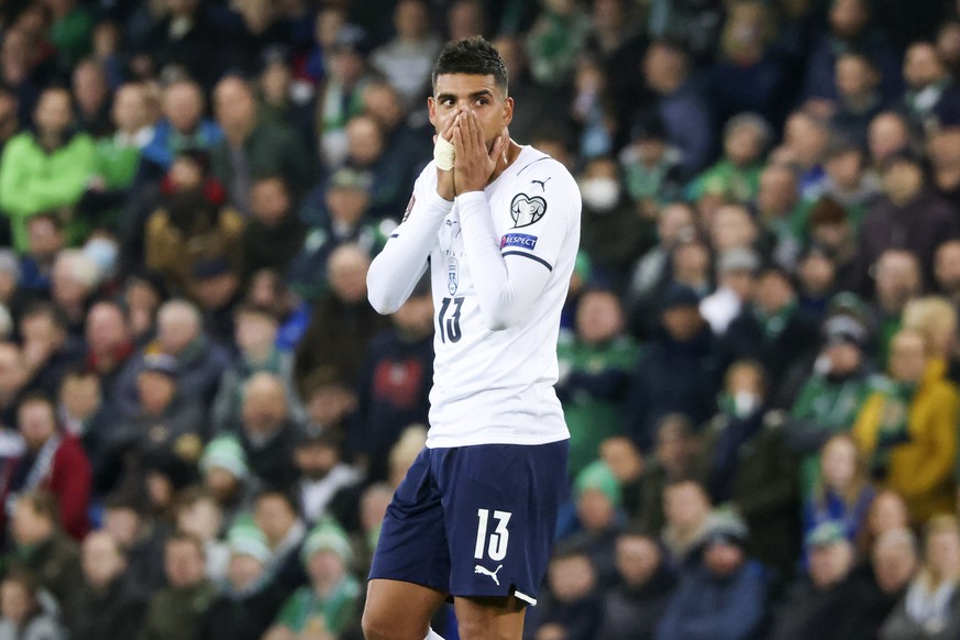 Emerson of Italy reacts during the World Cup 2022 group C qualifying soccer match between Northern Ireland and Italy at Windsor Park stadium in Belfast, Northern Ireland, Monday, Nov. 15, 2021. (AP Ph ...