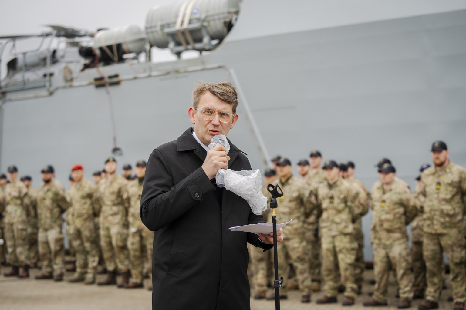 epa11258842 Danish Defense Minister Troels Lund Poulsen speaks after the frigate Iver Huitfeldt arrived at the base port at Naval Station Korsoer in Korsoer, Denmark, 04 April 2024. The Danish frigate ...