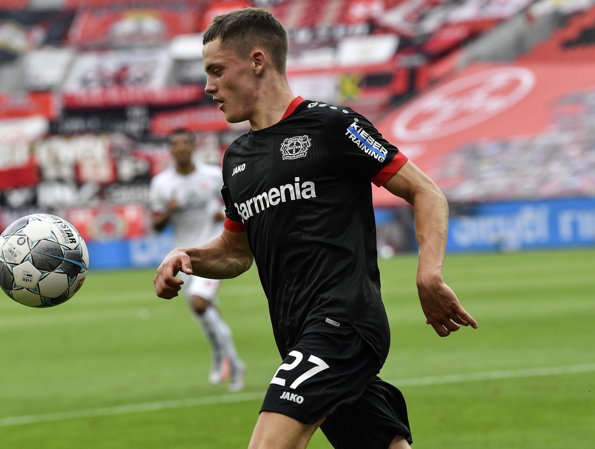 Bayer Leverkusen's Florian Wirtz runs for the ball during the German Bundesliga soccer match between Bayer 04 Leverkusen and FSV Mainz 05 in Leverkusen, Germany, Saturday, June 27, 2020. Because  ...