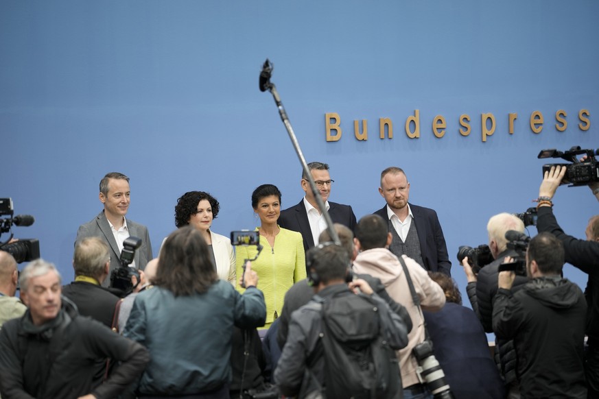 From left, Lukas Schoen, Amira Mohamed Ali, Sahra Wagenknecht, Ralph Suikat and Christian Leye arrive for a news conference to announce the founding of a precursor to a new party in Berlin, Germany, M ...