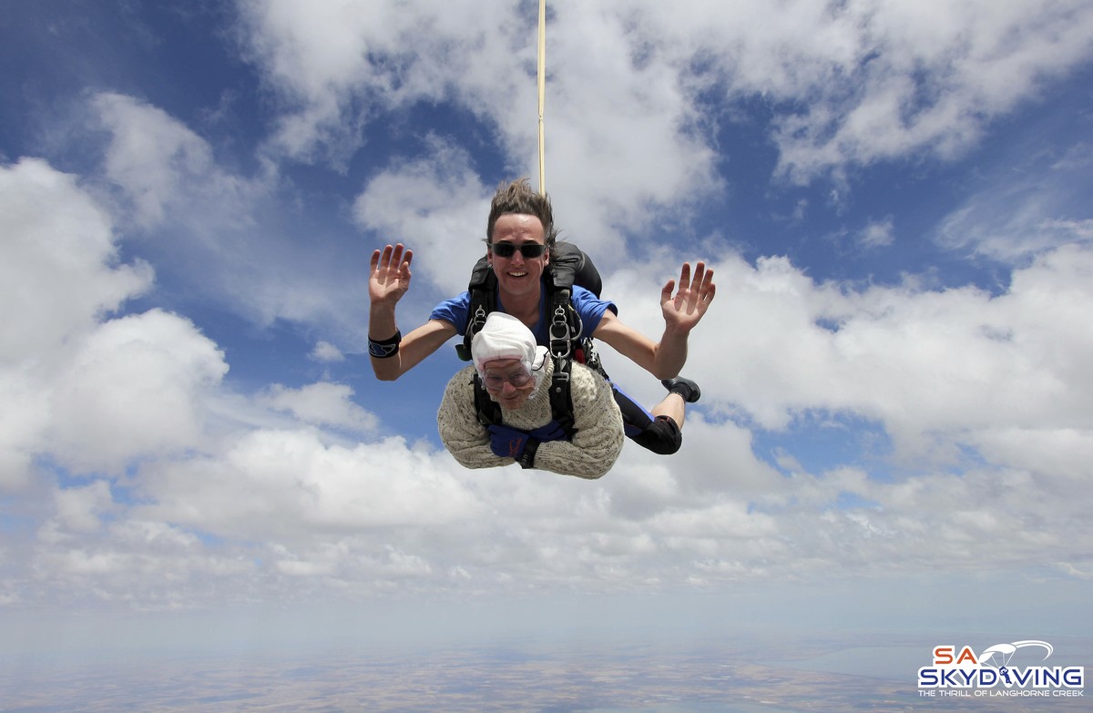 In this Dec. 9, 2018 photo, Irene O’Shea, bottom, skydives in Australia. A 102-year-old woman has completed a world record charity skydive in the Australian state of South Australia. Irene O'Shea ...