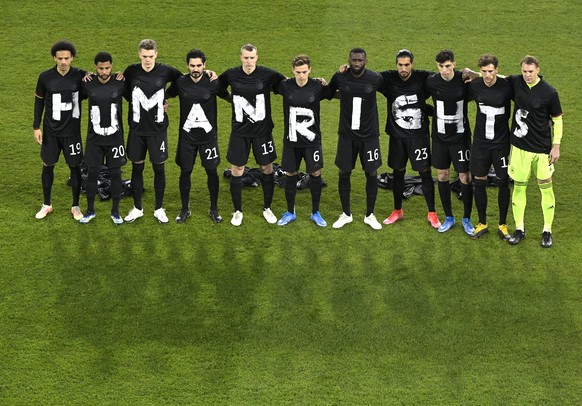 Germany&#039;s starting players pose for a team photo at the beginning of the World Cup 2022 group J qualifying soccer match between Germany and Iceland in Duisburg, Germany, Thursday, March 25, 2021. ...