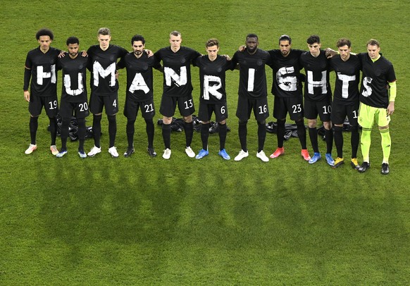 Germany&#039;s starting players pose for a team photo at the beginning of the World Cup 2022 group J qualifying soccer match between Germany and Iceland in Duisburg, Germany, Thursday, March 25, 2021. ...