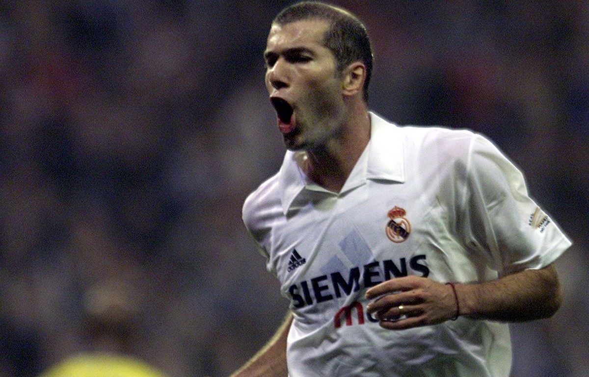 Real Madrid's French striker Zinedine Zidane celebrates after scoring against Villarreal during a Spanish league soccer match in the Bernabeu stadium in Madrid, Spain Saturday Oct. 26, 2002. (AP  ...