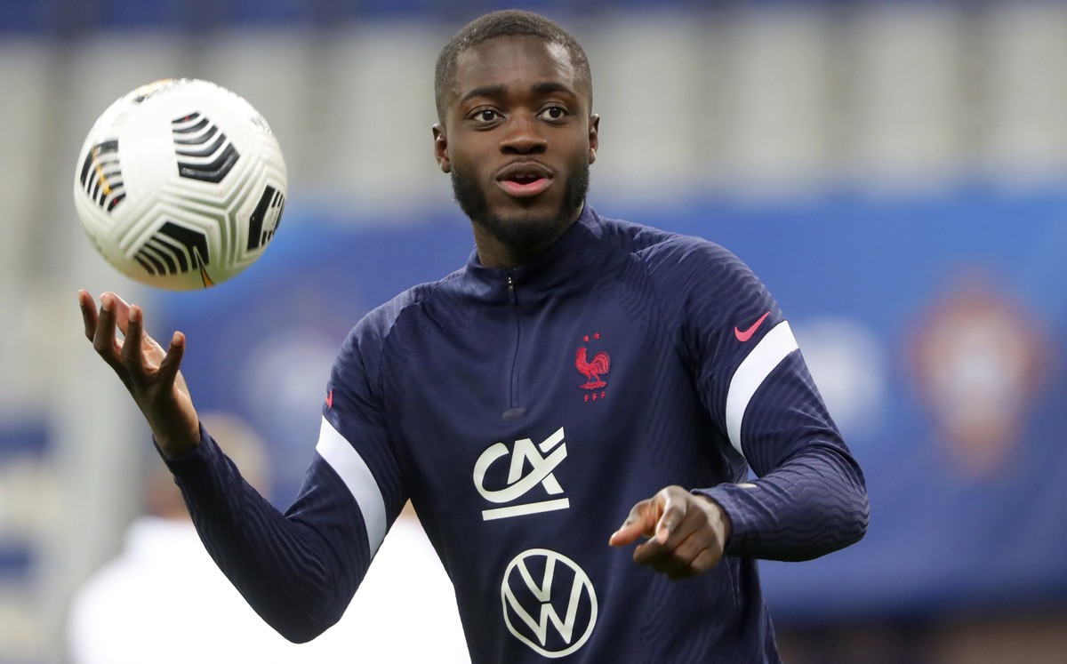 France's Dayot Upamecano holds a ball during warmup before the UEFA Nations League soccer match between France and Portugal at the Stade de France in Saint-Denis, north of Paris, France, Sunday,  ...