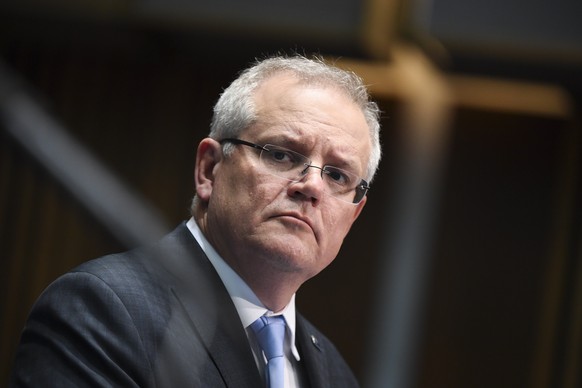 epa08588935 Australian Prime Minister Scott Morrison looks on during a press conference at Parliament House in Canberra, Australia, 07 August 2020. Morrison ruled out that the quarantine measures enfo ...