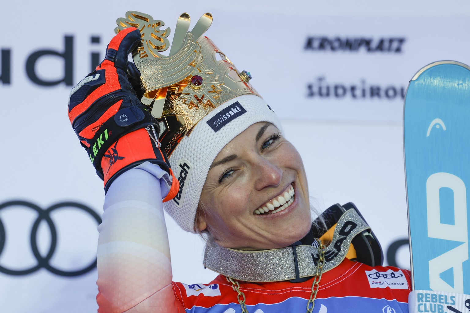 Switzerland&#039;s Lara Gut Behrami celebrates on podium after winning an alpine ski, women&#039;s World Cup giant slalom, in Kronplatz, Italy, Tuesday, Jan. 30, 2024. (AP Photo/Alessandro Trovati)