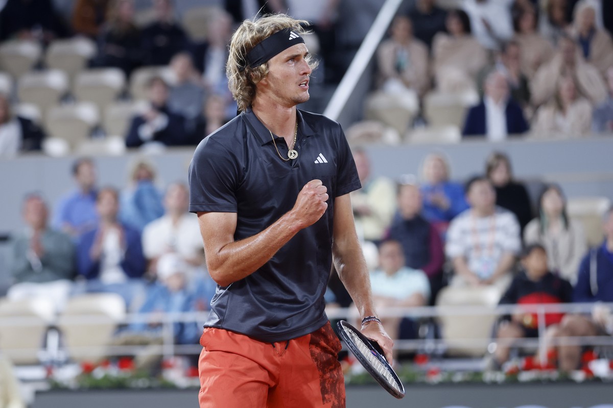 Germany's Alexander Zverev celebrates winning a point as he plays Frances Tiafoe of the U.S. during their third round match of the French Open tennis tournament at the Roland Garros stadium in Pa ...