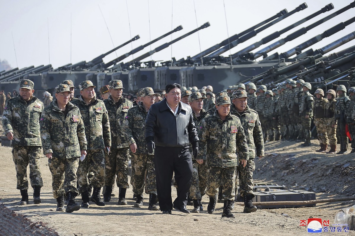 FILE - In this photo provided by the North Korean government, North Korean leader Kim Jong Un, center, supervises artillery firing drills in North Korea on March 7, 2024. (Korean Central News Agency/K ...