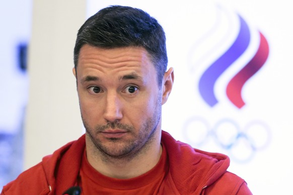 FILE - In this Tuesday, Dec. 12, 2017 file photo, Russia national ice hockey team captain Ilya Kovalchuk listens to a journalists question during a news conference followed an Russian Olympic committe ...