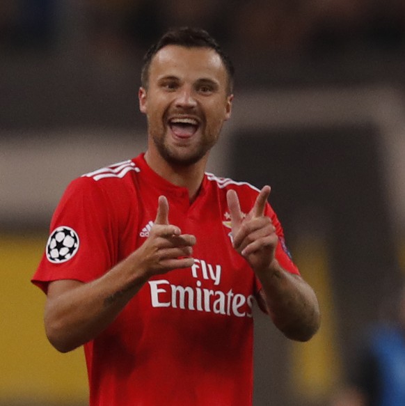 Benfica&#039;s Haris Seferovic, celebrates after scoring the opening goal during a Group E Champions League soccer match between AEK Athens and Benfica at the Olympic Stadium in Athens, Tuesday, Oct.  ...