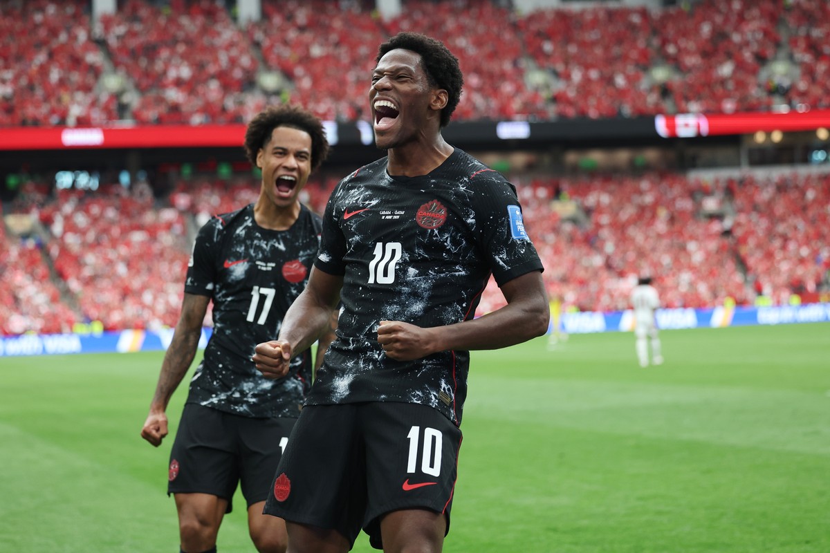 Canada's Jonathan David (10) celebrates after scoring their second goal during the World Cup Group B soccer match between Canada and Qatar in Vancouver, British Columbia, Thursday, June 18, 2026. ...