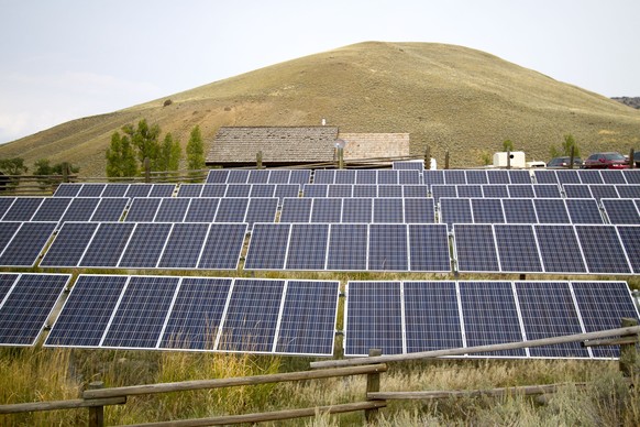 FILE - This Aug. 27, 2015, file photo shows a solar power array that is part of sustainability improvements at the Lamar Buffalo Ranch in Yellowstone National Park, Wyo. Renewable energy developers sa ...