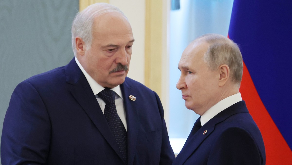 FILE - Belarusian President Alexander Lukashenko, left, and Russian President Vladimir Putin talk prior to the Supreme State Council of the Union State Russia-Belarus meeting in Moscow, Russia, April  ...