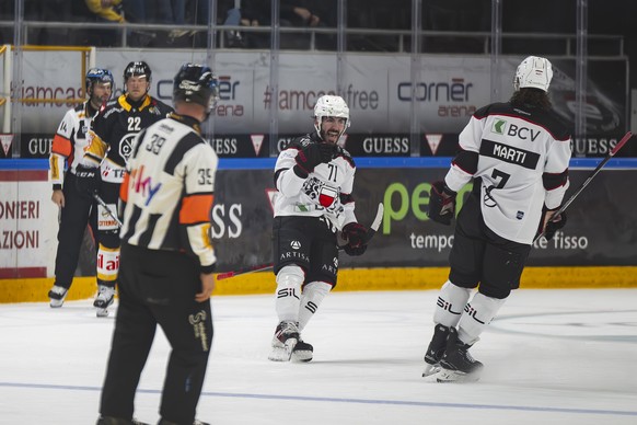 Benjamin Bougro (LHC), celebrates the 3 - 2 goal, during the regular season of National League A (NLA) Swiss Championship 2025/26 between HC Lugano andLausanne HC at the ice stadium Cornèr Arena in Lu ...