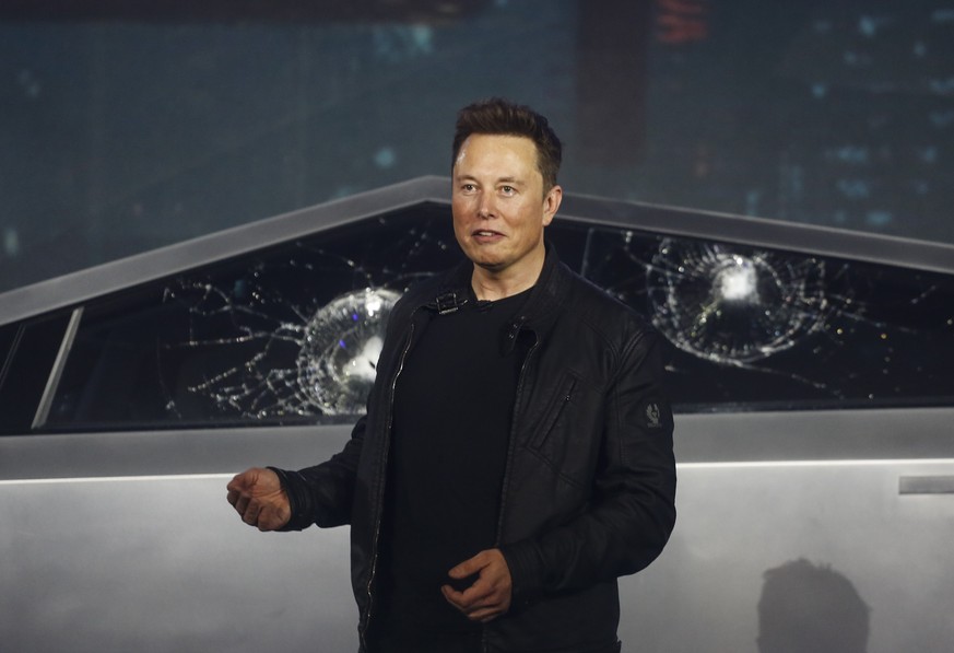 Tesla CEO Elon Musk introduces the Cybertruck at Tesla&#039;s design studio Thursday, Nov. 21, 2019, in Hawthorne, Calif. Musk is taking on the workhorse heavy pickup truck market with his latest elec ...