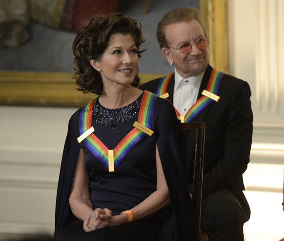 epa10348912 Amy Grant and Bono attend a reception for Kennedy Center Honorees hosted by President Joe Biden and First Lady Jill Biden in the East Room of the White House in Washington, DC, USA, on 04  ...