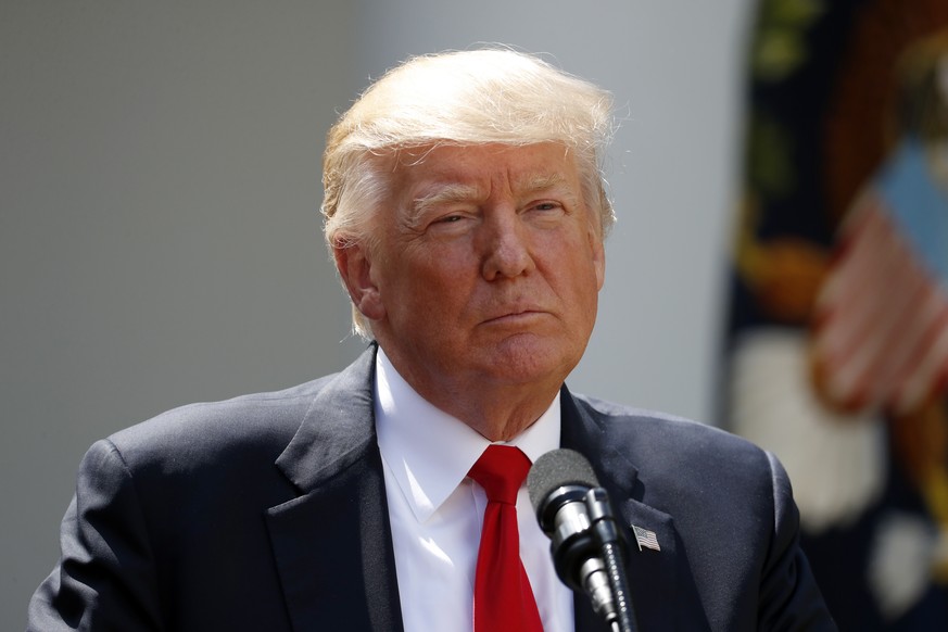 In this photo taken July 26, 2017, President Donald Trump pauses while speaking in the Rose Garden of the White House in Washington. (AP Photo/Alex Brandon)