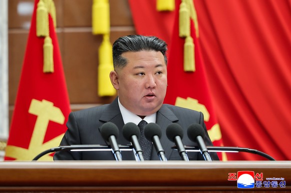 epa12584343 A photo released by the official Korean Central News Agency (KCNA) shows North Korean leader Kim Jong Un speaking during the second day of the 13th Plenary Meeting of the Eighth Central Co ...