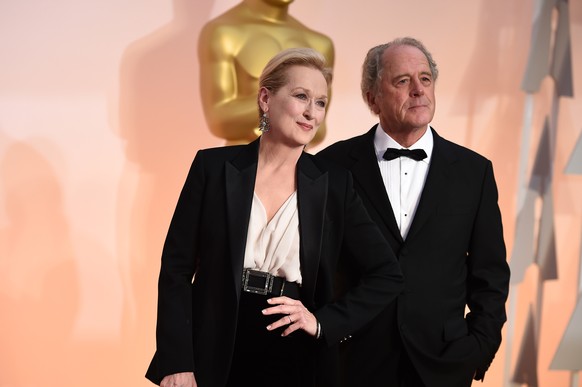 Meryl Streep, left, and Don Gummer arrive at the Oscars on Sunday, Feb. 22, 2015, at the Dolby Theater in Los Angeles.  (Photo by Jordan Strauss/Invision/AP)