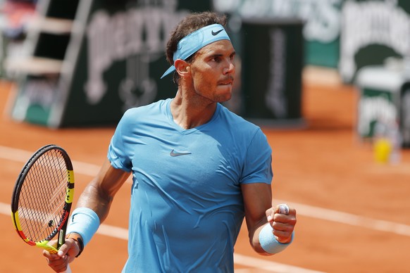 Spain&#039;s Rafael Nadal clenches his fist after scoring a point against Argentina&#039;s Diego Schwartzman during their quarterfinal match of the French Open tennis tournament at the Roland Garros s ...