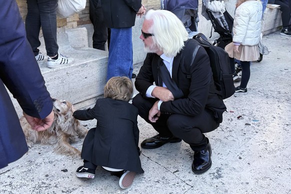 KEYPIX - Julian Assange attends the funeral of Pope Francis in St. Peter's Square at the Vatican, Saturday, April 26, 2025. (Giusi Brega/LaPresse via AP)