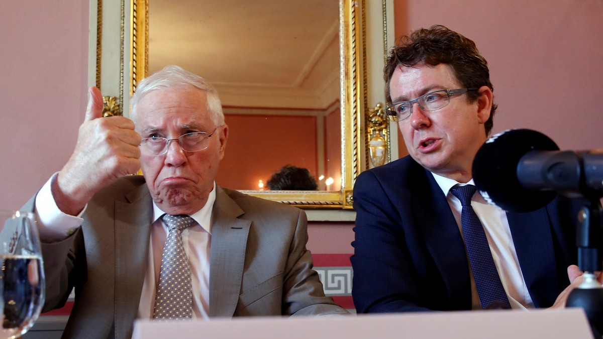 Christoph Blocher president of the "No to slow EU accession" committee (L), gestures next to Albert Roesti, president of the Swiss People's Party (SVP), during a news conference in Bern ...