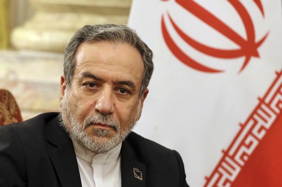 Iranian Foreign Minister Abbas Araghchi looks on during a meeting with Director General of the International Atomic Energy Agency (IAEA) Rafael Grossi, and Egyptian Foreign Minister Badr Abdelatty, at ...
