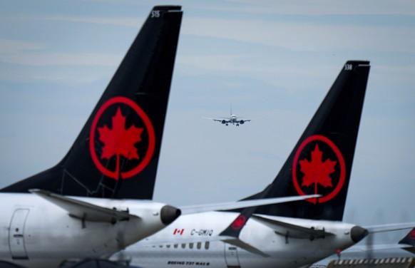 FILE - Air Canada aircraft sit parked at Vancouver International Airport in Richmond, British Columbia, Aug. 18, 2025. (Darryl Dyck/The Canadian Press via AP, file)
Canada Air Canada Flight Attendants