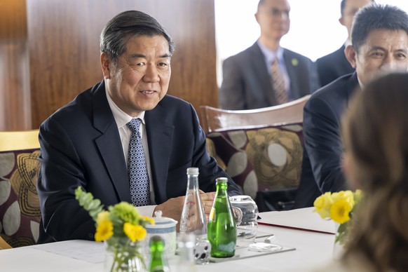 epa12086670 Chinese Vice Premier He Lifeng (L) listen to the speeches, during a bilateral meeting between Switzerland and China, in Geneva, Switzerland, 09 May 2025. EPA/MARTIAL TREZZINI / POOL