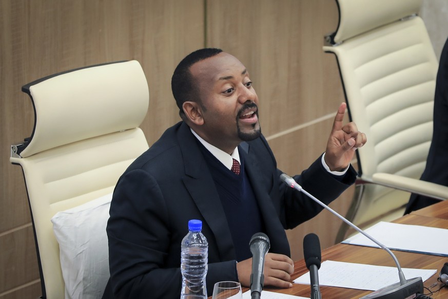Ethiopia's Prime Minister Abiy Ahmed addresses lawmakers at the parliament in Addis Ababa, Ethiopia Thursday, July 7, 2022. Abiy said Thursday his government's police and soldiers are dying on a &quot ...