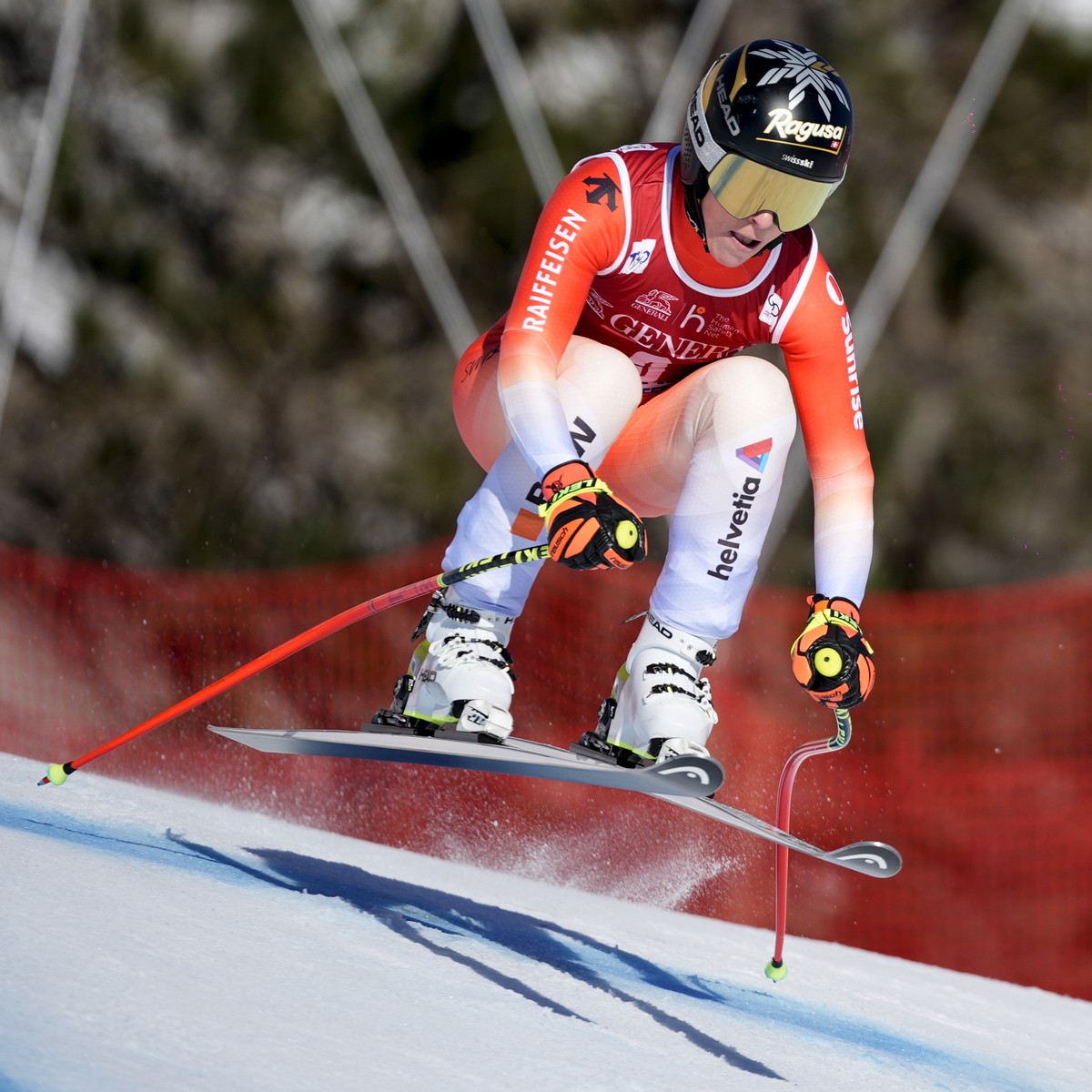 Switzerland's Lara Gut Behrami competes in an alpine ski, women's World Cup downhill race, in Cortina d'Ampezzo, Italy, Friday, Jan. 26, 2024. (AP Photo/Giovanni Zenoni)