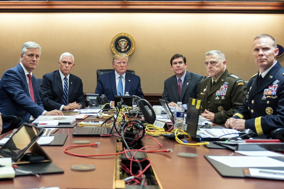 In this photo provided by the White House, President Donald Trump is joined by from left, national security adviser Robert O'Brien, Vice President Mike Pence, Defense Secretary mark Esper, Joint  ...