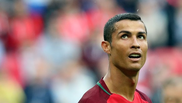 epa06035579 Cristiano Ronaldo of Portugal reacts during the FIFA Confederations Cup 2017 group A soccer match between Portugal and Mexico at the Kazan Arena in Kazan, Russia, 18 June 2017. EPA/TOLGA B ...