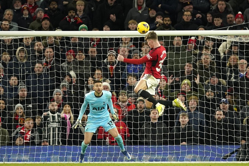 Manchester United&#039;s Scott McTominay makes an attempt to score past Tottenham&#039;s goalkeeper Guglielmo Vicario during the English Premier League soccer match between Manchester United and Totte ...