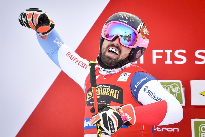 Switzerland&#039;s Regez Ryan reacts after winning the men&#039;s big final during the FIS Freestyle Ski Cross World Cup, in Idre, Sweden, Saturday, Jan. 22, 2022. (Anders Wiklund/ TT News Agency via  ...