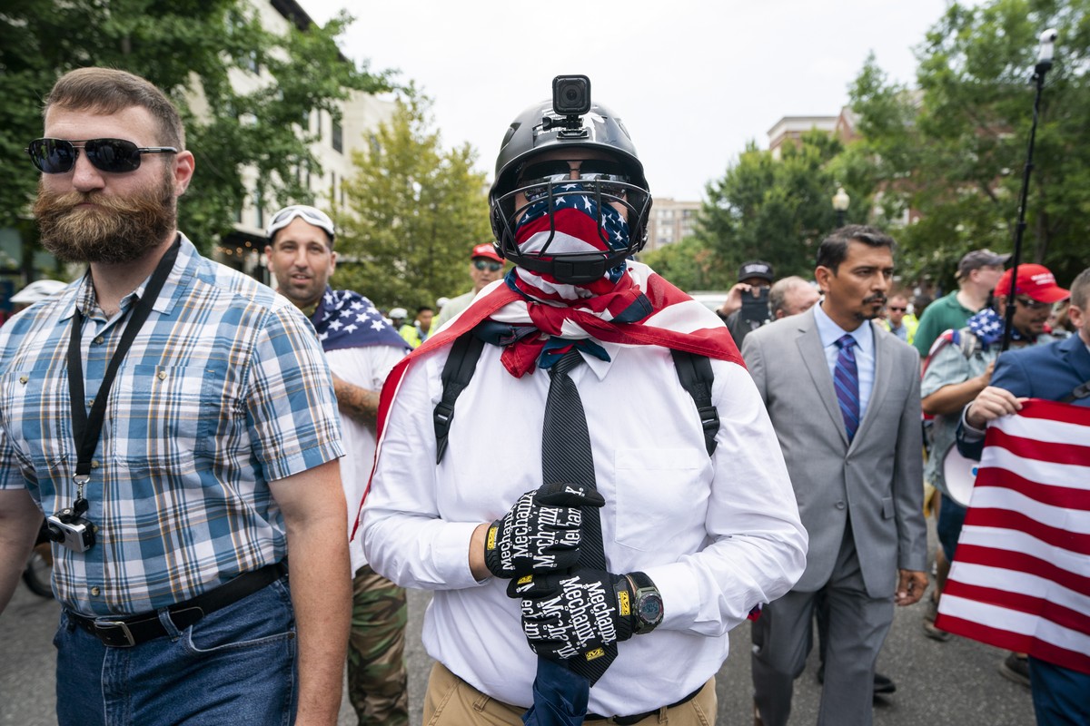 epa06946800 White supremacists and members of the alt-right march to the White House on the anniversary of last year's 'Unite the Right' rally in Washington, DC, USA, 12 August 2018. On ...