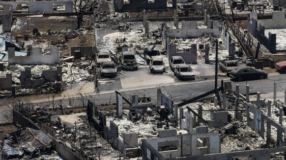 A general view shows the aftermath of a devastating wildfire in Lahaina, Hawaii, Tuesday, Aug. 22, 2023. Two weeks after the deadliest U.S. wildfire in more than a century swept through the Maui commu ...